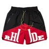 2024 neue Rhude Shorts Männliche und weibliche Designer 3M Reflektierende Sommer Mode Schnell trockene Straße Kleidung Fashion Casu