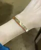 Bracelet de haute qualité Bracelet en acier inoxydable Famme Luxury Designer Brand Jewelry Ladies Couple Vis Love 6 mm 4 Diamants avec boîte Dhgate en gros