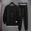 Men tracksuit set jogging pak met zakken gezellige sportkleding 2 -stuk sweatshirt broek ensemble elastische taille voor herfst 240325