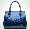 Sac 2024 Patent en cuir de haute qualité Tote de luxe Simple Color Color Stone Modèle Messager Messenger pour femmes