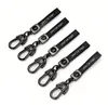 Keychains Car Keychain Pu en cuir PU Cavychain Standard avec une corde clé anti-perte accessoires haut de gamme suspendus