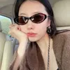 2024 fashion OFF Luxury Designer New Men's and Women's Sunglasses Off Small Fragrant Cat's Eye Ins Tidy Pearl Chain Net Red