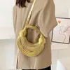 女性向けのショッピングバッグハンドバッグ2024ゴールドラグジュアリーデザイナーブランド手織り麺ロープ結び付けられたプルホーボーシルバーイブニングクラッチシック