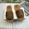 Sandales de créateur Luxury Femme Woody Clogs Mule Flat Sandales Sandals Letter Locage Pantoufles Slippers Pinks Summer Place Plateforme Herringbone Chaussure Herringbone