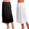 Kjolar kvinnor solid färg elastisk midja spets lapptäcke underskirt petticoat midi kjol