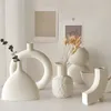 Vasos 1pc Donuts ocos circulares nórdicos vaso de cerâmica branca vaso de cerâmica criativa DIY DIY PLAY Decoração de sala moderna