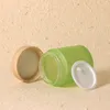 Bouteilles de rangement pots en verre vert noir blanc transparent transparent cosmétique en plastique faux couvercle de bois 100g bouteille de recharge