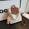 Branche de marque French Trendy Femme 2023 Nouvelle tendance Fashion Poids Réduction Porte Voyage Portable Sac à dos de voyage de grande capacité