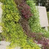 Dekorativa blommor konstgjorda hängande murgröna girland växter vinrank
