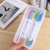 Bouteilles Boîte à crayon transparent grande capacité Étui à stylo à poussière étanche avec une papeterie en plastique bouclé pinceau