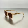Occhiali da sole designer di lusso Nuovi occhiali da sole 0774 Scatola da donna Piatto di moda Polvere di protezione UV Lettera vuota