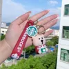 Decompressiespeelgoed Exquise Bear Barista Doll Keychain Milk Tea Cup Key Hangende sieraden ornamenten Kleine geschenken