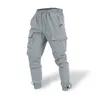 Pantalon masculin automne et hiver surdimensionné décontracté en vrac tissé avec plusieurs poches pour le travail sportif