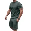 Herrspårar män t-shirt shorts set enkla fickor tvådelar knä längd byxor sommar spårdräkt ung stil