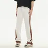 Design a strisce da uomo a strisce sciolte sciolte drappeggiatura a gamba larga hip hop personalità retrò di pantaloni casuali