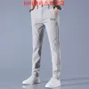 Брюки бренд титул Men Men Golf Pants 2023 Осень Новые высококачественные эластичности мод повседневные брюки мужская дышащая гольф одежда