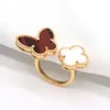 High -End -Temperament, vier Blattklee Schmetterlingsring, koreanische und gleichgültiger Stil von Frauen, Nischenleuchten, weiße Fritillaria offener Ring