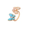 Anello di farfalla femminile per trifoglio oro 18K con fritillaria bianca doppia anello di farfalla diamantato full diamante e lusso alla luce della moda turchese