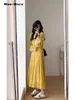 Casual jurken 2024 Spring lange mouw ronde nek vouwen midi dames causale vaste kleur chique hoge taille a-line gele jurk