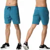 Pantaloncini da uomo in palestra indossare cortometraggi di allenamento fitness uomini sport pantaloni corti da basket da basket calcio pantaloncini 240323