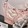 Europäische und amerikanische sexy sexy Taille Hohlköcher Spitzen Unterwäsche Frauen transparente Bogen bequeme Maschenhöhe weibliche Briefs 2024 240402