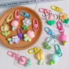 Keychains hars tulpen sleutelhanger hanger bloemenmeisje hart schattige tas ornament hoofdtelefoon sleutelhangers van case decoratie