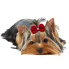 Hundekleidung 20pcs süße Haustier Haarnadelkatze Feste Farbe karierte Bogen Haare für Hunde Boutique Pflegezubehör