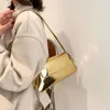 2024 Bolsas de designer de luxo para mulheres a laser axilas de bolsa de ombro prateado chique chique de maça