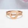 Wen Jian Roman Digital Luxury Produit titane acier plaqué Rose Gold Ring Fashion Fashion Corée Édition personnalisée Index Ring Color Gold