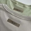 Coton T-shirt Coton T-shirt Polo Polo Ess Lettes Flocked Lettres Loose et confortable T-shirt à manches à manches courtes et à manche