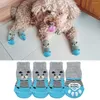 Ropa para perros 4pcs zapatos de cachorro lindo dibujos animados calcetines de mascotas de punto sin desliz