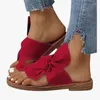Slippers 2024 Chaussures féminines Twist Knot Flat Toe Loop Slides Couleur solide Open Bohomian Outdoor Summer Beach