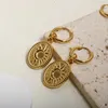 Boucles d'oreilles Jinhui Vintage Round Pendante Sun Moon Gravure Gold Couleur en acier inoxydable Fashion Simple Women's Bijoux