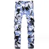 Mäns jeans sommar 2024 Street Print mode personliga blommiga byxor alternativa trender alla matchar stretch blyerts jeans män barn kläder jeans barn denim jeans