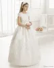 Klänningar Första nattvardsklänningar för flickor Scoop Rygglösa Applices Flower Girls Dress Bows Tulle Ball Gown Pageant Dresses For Little Girl