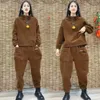 Zweiteilung der Frauen zwei Stückhosen Fügen Sie Samt Herbst Winter Cord Cord-Pullover langärmelige Tops Loose Model Mother Sets Overalls zweiteiliger Anzug