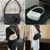 2024 Kobiety Tote torebki na pół okrągłego designu marka skórzana torba na ramię moda torba crossbody luksusowa wykwintna torebka10a