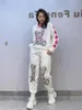 Pantaloni da due pezzi da donna Slieta allentata primavera Autunno pesante perforazione a maniche lunghe con cappuccio e pantaloni da streetwear da donna a maglia