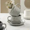 Tazze di tazze da caffè piattiere in ceramica squisita set da tè pomeridiano nordico di tè a rete.