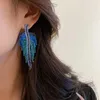 Les boucles d'oreilles enracinent les longs pivotants pour les femmes filles asymétriques en strass