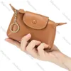 2024 Fashion Fashion de haute qualité Couleur solide Sac pour femmes exquise mini monnaie grande capacité Organisateur de monnaie Keychain mignon 10a