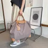 2024 Sac fourre-tout à grande capacité Holidays Sac de voyage Femmes Duffle Sac Nouveau sac à main en nylon Big sac de week-end bagage de nuit Bolso10a