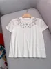 Camicie da donna 2024 all'inizio della primavera pesante fatte a mano Diamond abbellimento rotondo a collo bianco cotone versatile top-shirt a maniche corte