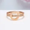 Wen Jian Roman Digital Luxury Product Titanium Steel Plated Rose Women's Fashion Korean Edition Personlig pekfinger ringfärg guld