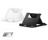 Hela Universal Folding Table Cell Phone Support Plastic Holder Desktop Stand för din telefon Smarttelefon Tablett Ring Holder6549193