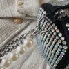 Axelväskor kvinnor 2024 lyxiga strassväskor och handväskor kvinnliga shoppare mode fasta färg pärlkedja fatformad