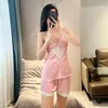 Roupas domésticas Sexy Lace Hollow Out Mulheres 2pcs Sleep Sleep Strap Top shorts Pijamas Terne Summer Setin Pijamas Sleepwear Nightwear