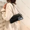 2024 bolsas de grife de luxo para mulheres axilas a laser saco de ombro prata chique chique de alça fêmea saco de sacola de compras 10a