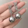 ユニークな文字真珠2023新しいトレンディなニッチデザイン、ハイエンドのイヤリング、気質、および女性のイヤリング