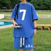 夏の特大のカジュアルなファッショントラックスーツルーズジョギングワッフルスーツの男性ショートスリーブTシャツスポーツショーツ2PCSセットアウトフィットY240403